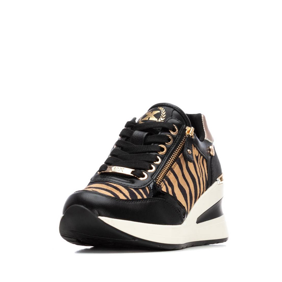 Schwarzer Wedgesneaker mit Zebra-Print und goldfarbenen Akzenten