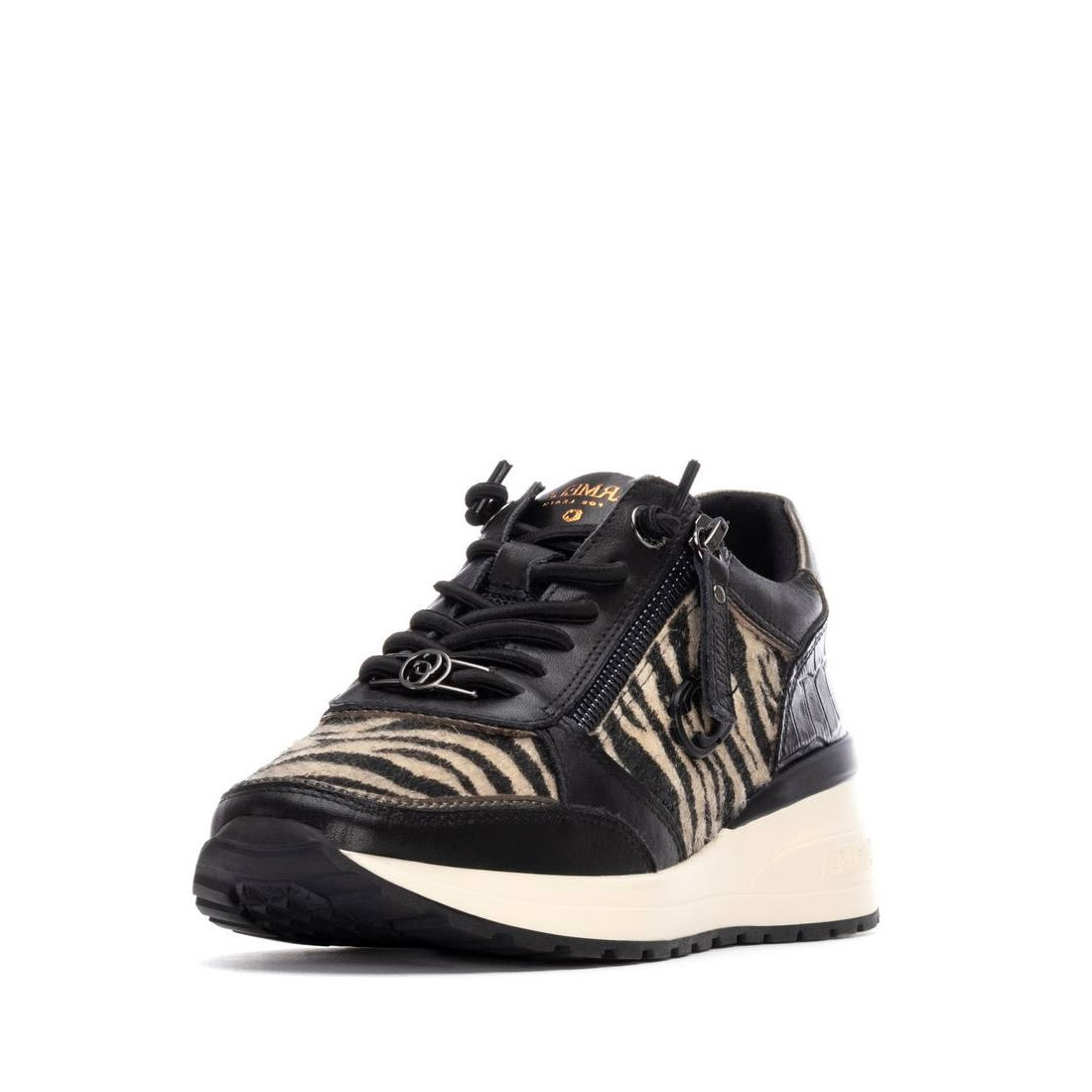 Leder-Sneaker mit Zebramuster und Keilsohle in Schwarz-Weiß