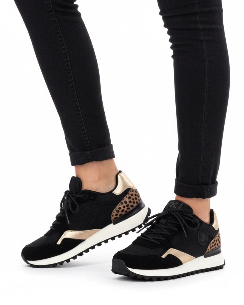 Eleganter Sneaker in Schwarz mit goldfarbenem Detail und Leo-Fersenbesatz