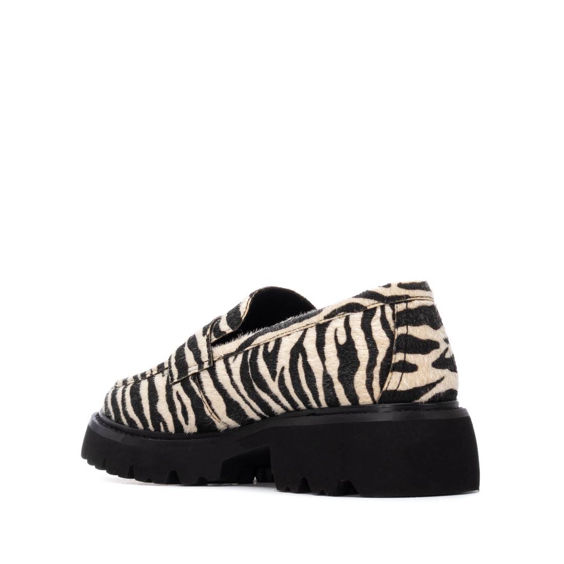 Eleganter Loafer in Zebra-Felloptik mit markanter Profilsohle